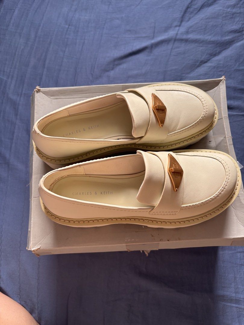 Metallic Accent Chunky Platform Penny Loafers - Chalk (Category: Loafers) located in Bacolod City. Submitted by nczr96 (Listing ID 1461872506, Image 3). Description: Metallic Accent Chunky Platform Penny Loafers - Chalk Original C&K Penny loafers in color CHALK Very good condition Very minimal crease only Still very sturdy No fading/flaws on gold hardware Still with (a worn) box. Used twice only. Bought in Singapore RFS: one size too big for me. 