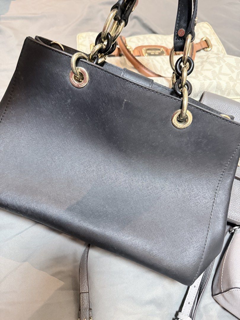 Take All 5 MK & Coach Bags (Category: Luxury Bags & Wallets) located in Angono. Submitted by khendyreyes (Listing ID 1462023225, Image 2). Description: - Bundle of 5 designer handbags - Includes: MK Cynthia, Grey Michael Kors crossbody, Purple Coach satchel, MK Alma, MK Hamilton Monogram - Perfect variety for any occasion TAKE ALL ONLY FOR ONLY 3500 Pesos.