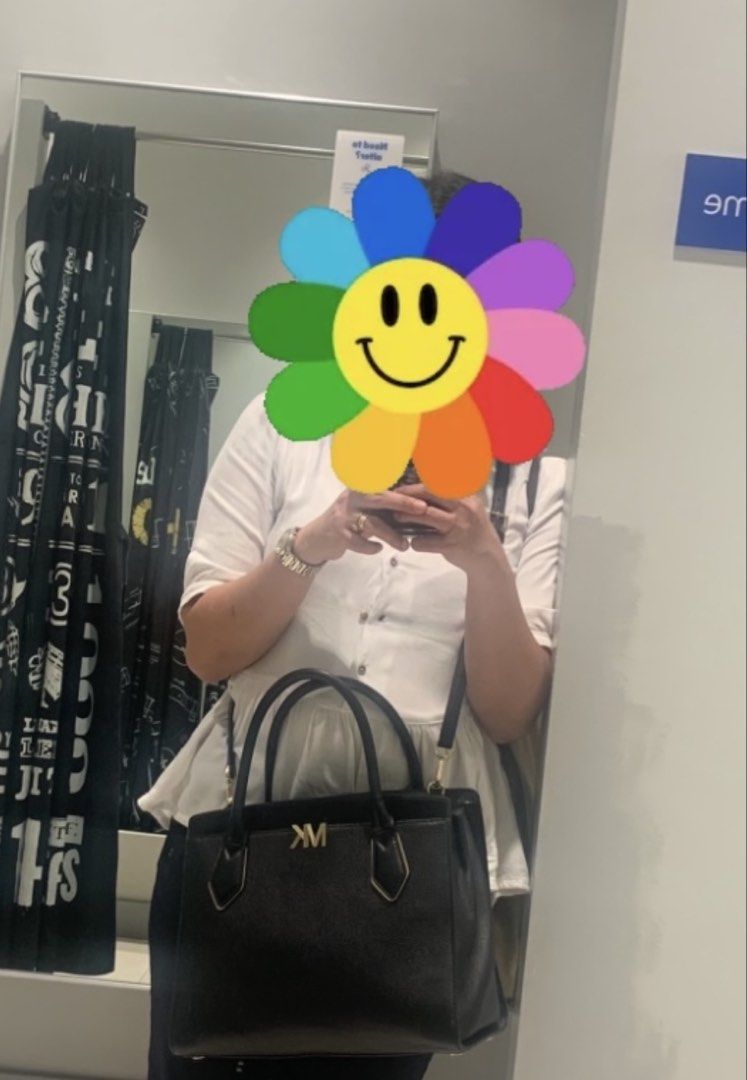 Michael Kors Black Leather Handbag (Category: Luxury Bags & Wallets) located in Legazpi City. Submitted by iceyag (Listing ID 1461833372, Image 1). Description: - Genuine black leather Michael Kors handbag - Elegant gold MK logo detail - Versatile top handles and detachable crossbody strap - Spacious interior for all your essentials - Ideal for both work and casual occasions - In good, pre-loved condition.