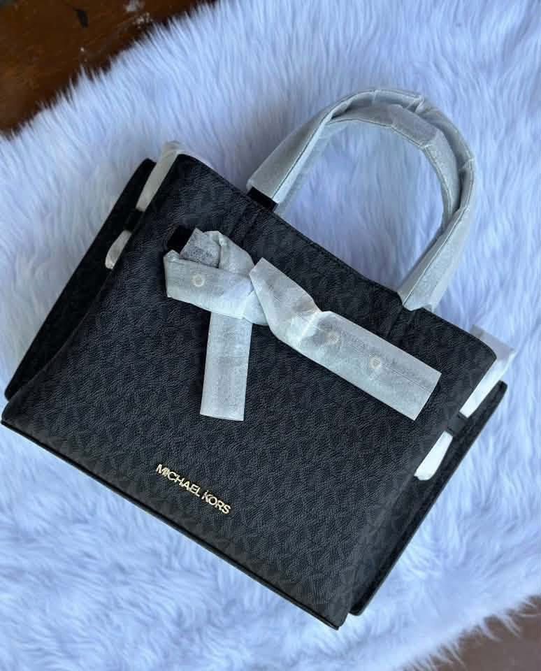 Michael Kors Emilia Satchel (Category: Tote Bags) located in Santa Rosa. Submitted by miqboutique (Listing ID 1461949507, Image 2). Description: MK Emilia Satchel ₱6,200 + SF • Ready to ship • Guaranteed Original Fb page: Miq's Boutique.