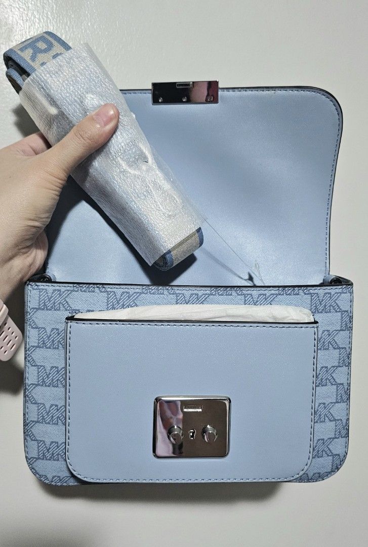 Michael Kors MK Sloan medium in blue (Category: Cross-body Bags) located in Quezon City. Submitted by prettyluvbags (Listing ID 1461852953, Image 2). Description: MK sloan editor medium flap bag in Blue signature Brand new, 100% original US bought Pretty blue color🩵 Size estimate on last pic 4000+sf PAMIGAY SALE!!! LP na! price down from 5800.