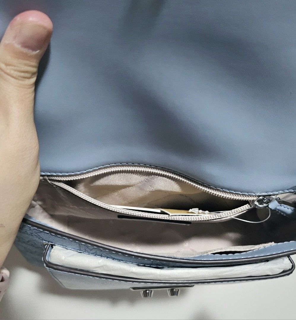 Michael Kors MK Sloan medium in blue (Category: Cross-body Bags) located in Quezon City. Submitted by prettyluvbags (Listing ID 1461852953, Image 3). Description: MK sloan editor medium flap bag in Blue signature Brand new, 100% original US bought Pretty blue color🩵 Size estimate on last pic 4000+sf PAMIGAY SALE!!! LP na! price down from 5800.