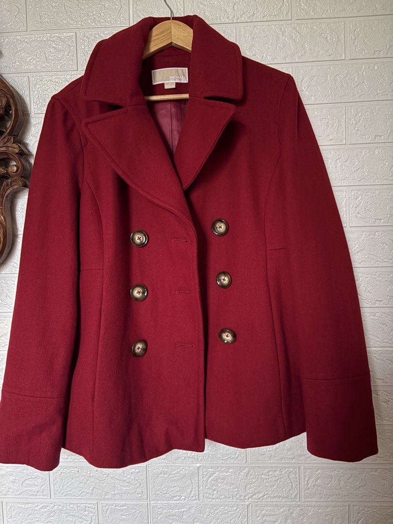 Michael Kors Red Double Breasted Peacoat (Category: Coats, Jackets and Outerwear) located in Batangas. Submitted by purple_and_orange (Listing ID 1461852467, Image 2). Description: - Classic red peacoat from Michael Kors - Double-breasted style - Features gold-tone buttons - Made from a warm wool blend fabric - Ideal for cooler weather - Versatile: looks great dressed up or down with jeans.