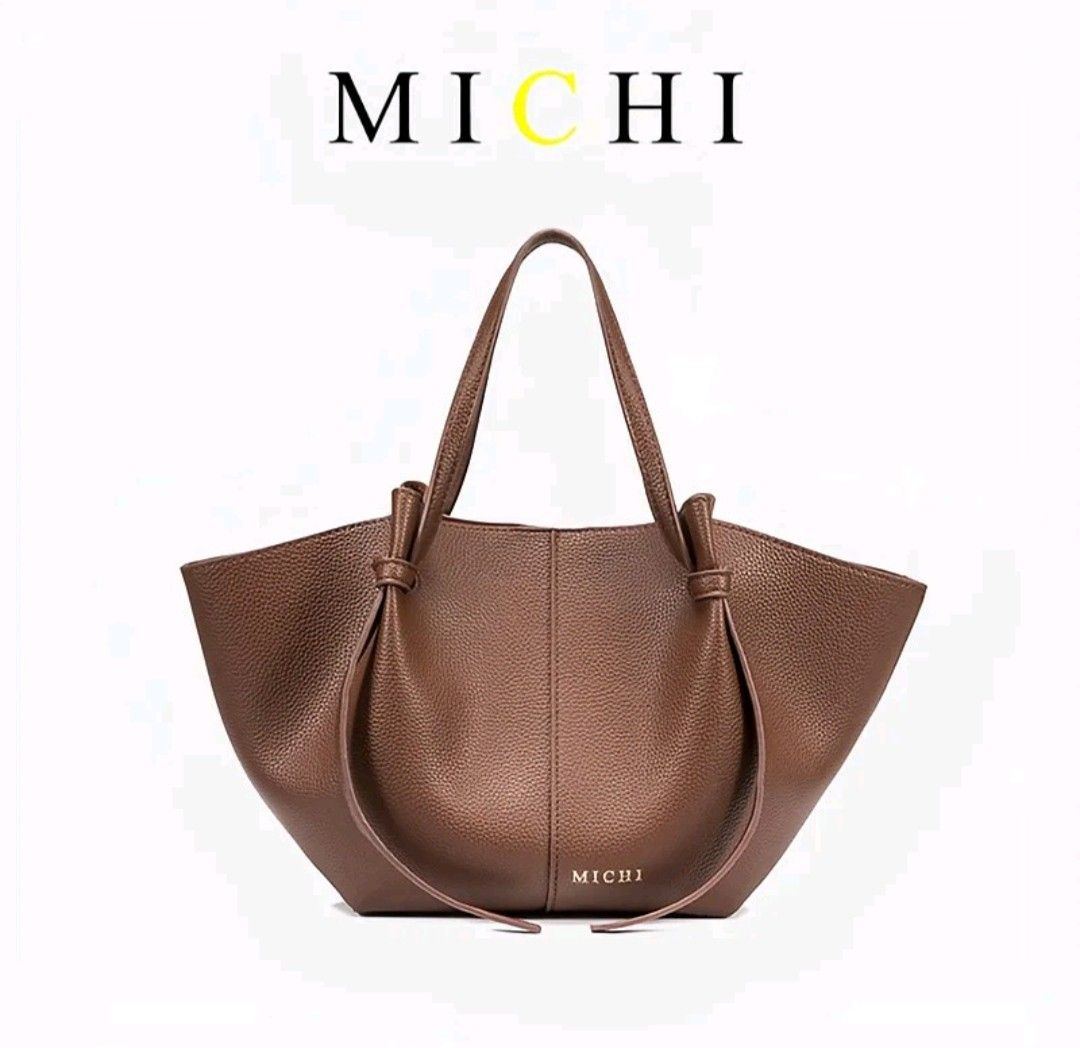 MICHI Small Tote Bag + Felt insert bag organizer (Category: Tote Bags) located in Quezon City. Submitted by sclfxz (Listing ID 1461982695, Image 3). Description: MICHI Small Pebble Tote Bag ✨ + MICHI felt material insert bag organizer • GET this 2 for ₱700 💸 (This is such a Steal price na 🫶🏻) - Orig price of the Bag which I got at ₱899 - Orig price of the felt insert bag which I got at ₱199 Total: ₱1,098 From Tiktok 💯 - Only used Twice 😊🫶🏻