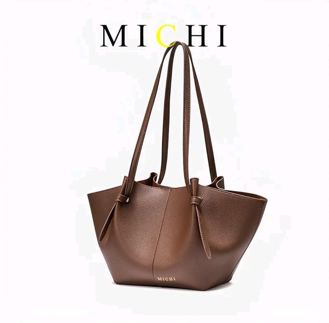 MICHI Small Tote Bag + Felt insert bag organizer (Category: Tote Bags) located in Quezon City. Submitted by sclfxz (Listing ID 1461982695, Image 2). Description: MICHI Small Pebble Tote Bag ✨ + MICHI felt material insert bag organizer • GET this 2 for ₱700 💸 (This is such a Steal price na 🫶🏻) - Orig price of the Bag which I got at ₱899 - Orig price of the felt insert bag which I got at ₱199 Total: ₱1,098 From Tiktok 💯 - Only used Twice 😊🫶🏻