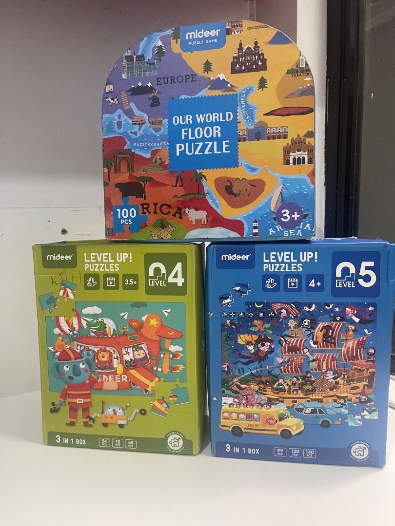 MIDEER PUZZLES (Category: Assessment Books) located in Marikina City. Submitted by bezz_bezzy (Listing ID 1461809081, Image 1). Description: - Mideer Puzzle Set for Kids - Includes 'Our World Floor Puzzle' (100 pieces, ages 3+) - Includes two 'Level Up! Puzzles' sets (Level 4 & 5) - Each Level Up set has 3 puzzles: 90, 120, and 140 pieces - Great for children's learning and entertainment.