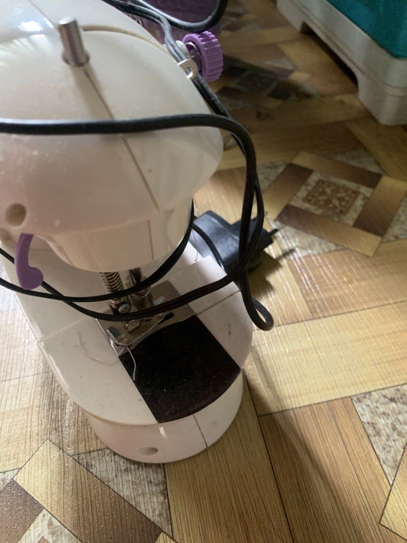 Mini Sewing Machine SM-202A with Double Threads (Category: Craft Supplies & Tools) located in Caloocan City. Submitted by diannecarl32964 (Listing ID 1461831569, Image 3). Description: - Mini Sewing Machine Model: SM-202A - Features: Double threads, 2 speed control - Includes: AC/DC adapter and foot pedal - Ideal for: Small sewing projects.