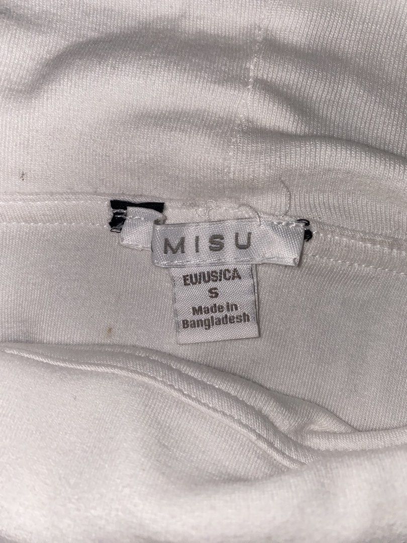 MISU White Off-Shoulder Long Sleeve Top Size S (Category: Longsleeves) located in San Jose del Monte. Submitted by skyarraa (Listing ID 1461880049, Image 3). Description: - White off-shoulder top - Long sleeves - Ribbed material - Snug fit - Brand: MISU - Perfect for dressing up or down - Easy to style with jeans or skirts.