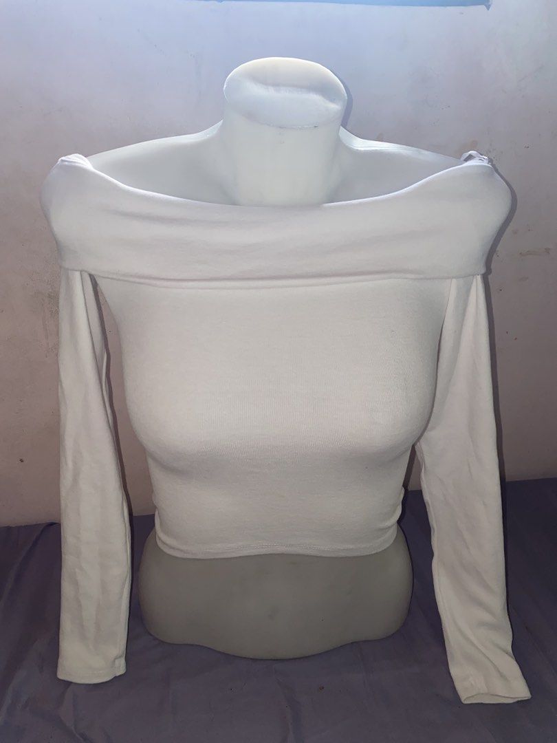 MISU White Off-Shoulder Long Sleeve Top Size S (Category: Longsleeves) located in San Jose del Monte. Submitted by skyarraa (Listing ID 1461880049, Image 2). Description: - White off-shoulder top - Long sleeves - Ribbed material - Snug fit - Brand: MISU - Perfect for dressing up or down - Easy to style with jeans or skirts.