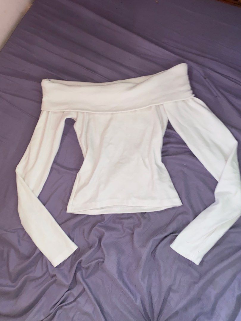 MISU White Off-Shoulder Long Sleeve Top Size S (Category: Longsleeves) located in San Jose del Monte. Submitted by skyarraa (Listing ID 1461880049, Image 1). Description: - White off-shoulder top - Long sleeves - Ribbed material - Snug fit - Brand: MISU - Perfect for dressing up or down - Easy to style with jeans or skirts.
