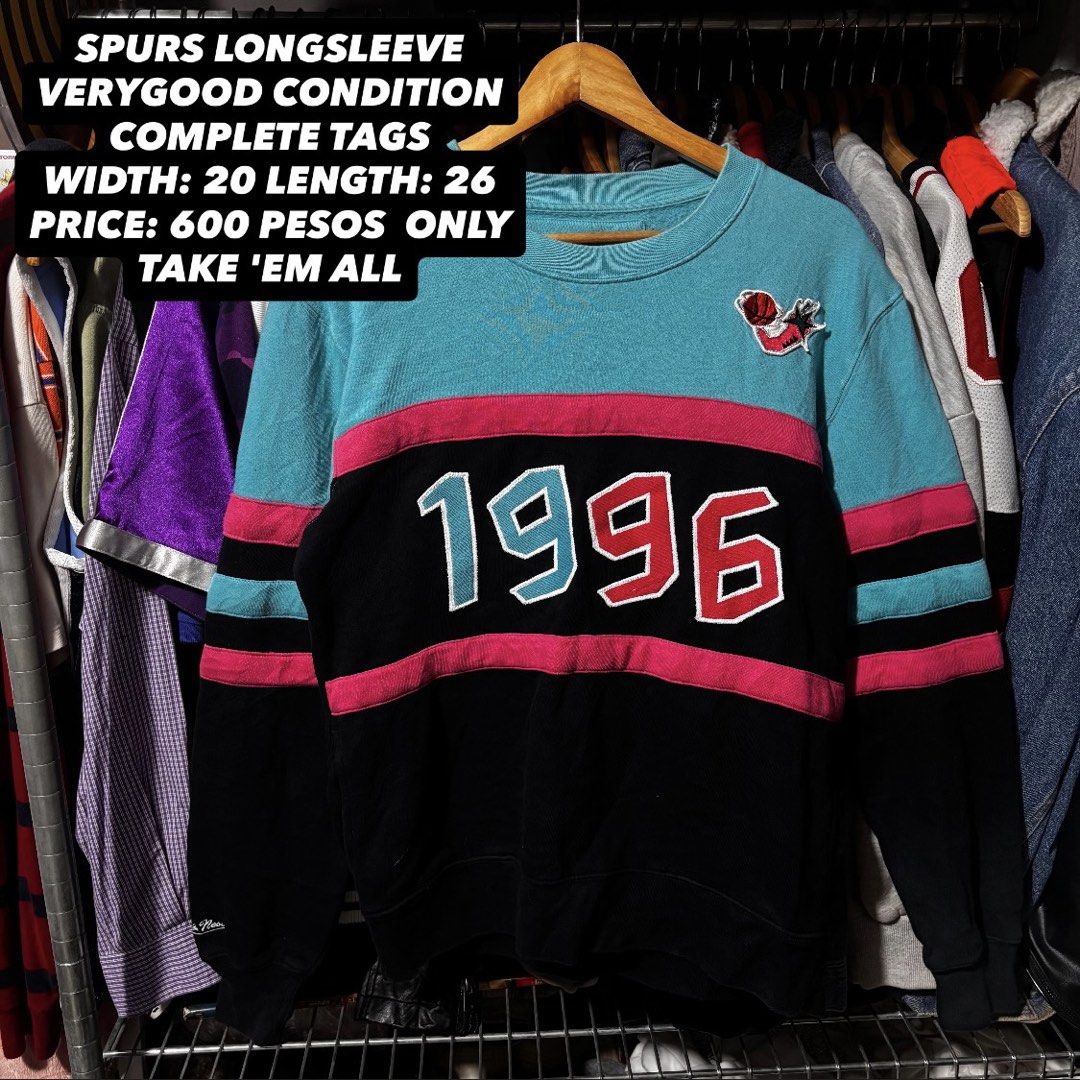 Mitchell & Ness NBA Hardwood Classics Spurs 1996 Sweatshirt (Category: Coats, Jackets and Outerwear) located in Caloocan City. Submitted by bonsatocha43876 (Listing ID 1461983555, Image 1). Description: - Mitchell & Ness Spurs Hardwood Classics sweatshirt - Features the iconic 1996 season - Striking teal, pink, and black colorway - Long sleeves for comfort - Brand new with original tags attached - Measurements: Width 20 inches, Length 26 inches -