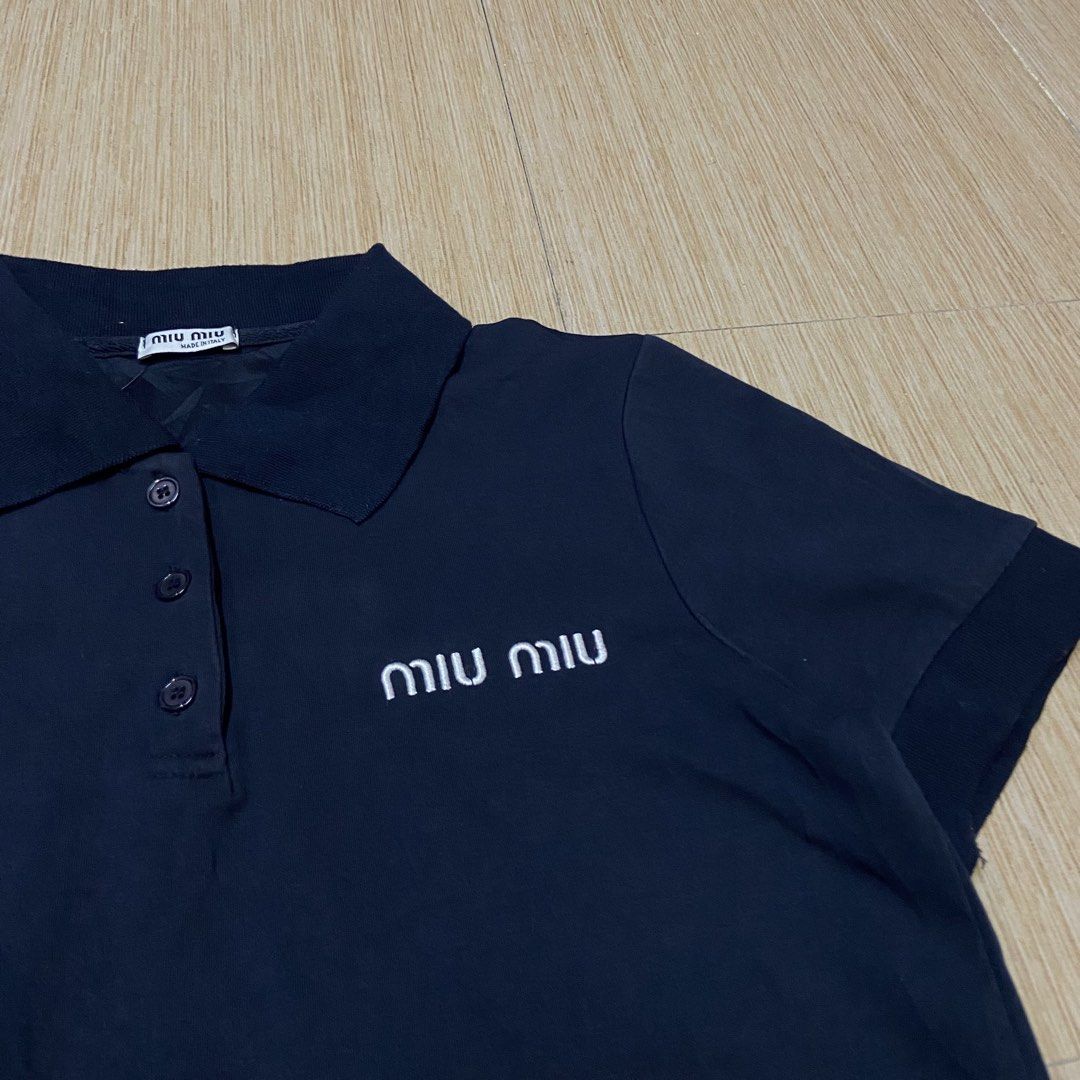 MiuMiu Polo Shirt (Category: Others Tops) located in Legazpi City. Submitted by luxrystreet (Listing ID 1461907071, Image 3). Description: ▪️MiuMiu Polo Shirt ▪️WIDTH: 18 ▪️LENGTH: 21 ▪️COLOR RATE: 9/10 Or better ▪️IN EXCELLENT CONDITION ▪️COLOR MAY VARY DUE TO LIGHTING ▪️MANAGE YOUR EXPECTATIONS CAN PROVIDE OTHER PICTURES UPON REQUEST ISSUE(S): NONE.