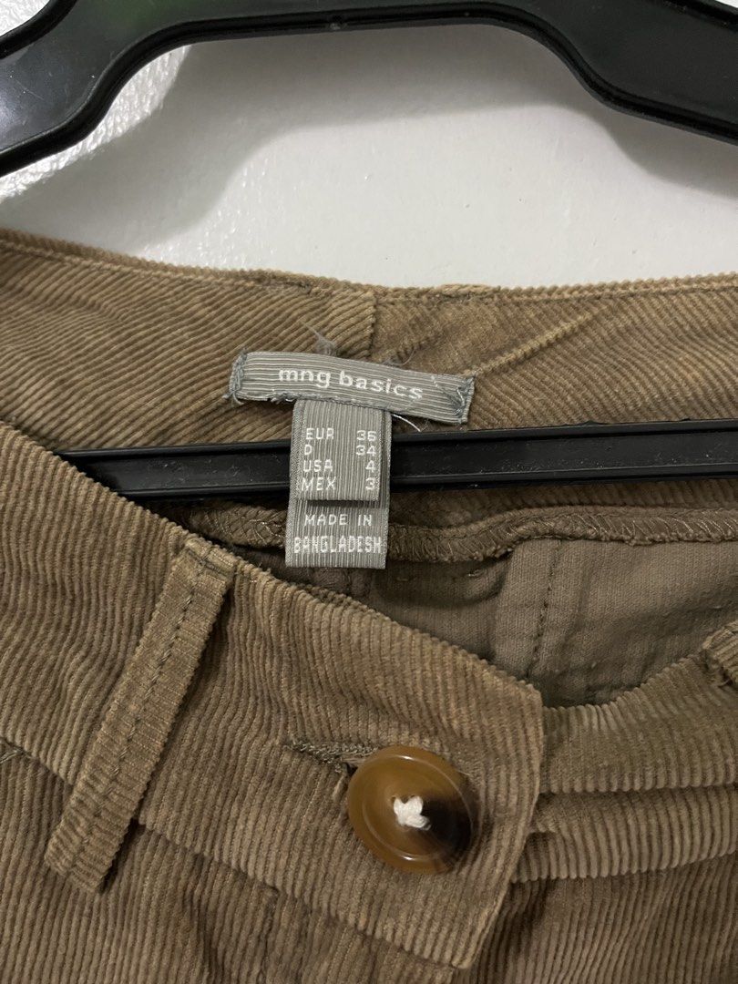 MNG Basics Pants (Category: Other Bottoms) located in Antipolo. Submitted by starraid777 (Listing ID 1461845484, Image 2). Description: Brown corduroy pants from MNG Basics. Straight leg fit. Button and zip closure. Two front pockets and two back pockets. Made in Bangladesh. Great for casual wear..
