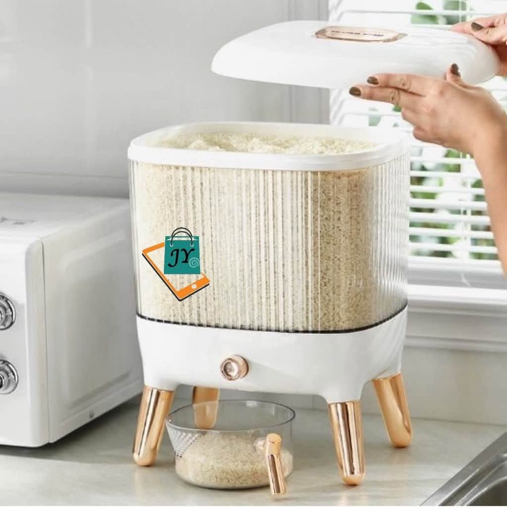 Modern Rice Dispenser with Measuring Cup (Category: Food Organization & Storage) located in Manila. Submitted by chaionlineshop (Listing ID 1461858797, Image 2). Description: - Stylish design to complement your kitchen decor. - Generous capacity for storing a good amount of rice. - Easy-to-use knob for convenient dispensing. - Includes a measuring cup for precise portions. - Keeps rice fresh, organized, and readily accessible. - Adds a touch of e
