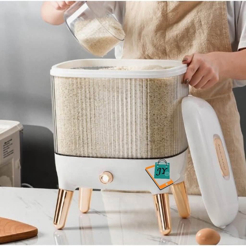 Modern Rice Dispenser with Measuring Cup (Category: Food Organization & Storage) located in Manila. Submitted by chaionlineshop (Listing ID 1461858797, Image 3). Description: - Stylish design to complement your kitchen decor. - Generous capacity for storing a good amount of rice. - Easy-to-use knob for convenient dispensing. - Includes a measuring cup for precise portions. - Keeps rice fresh, organized, and readily accessible. - Adds a touch of e