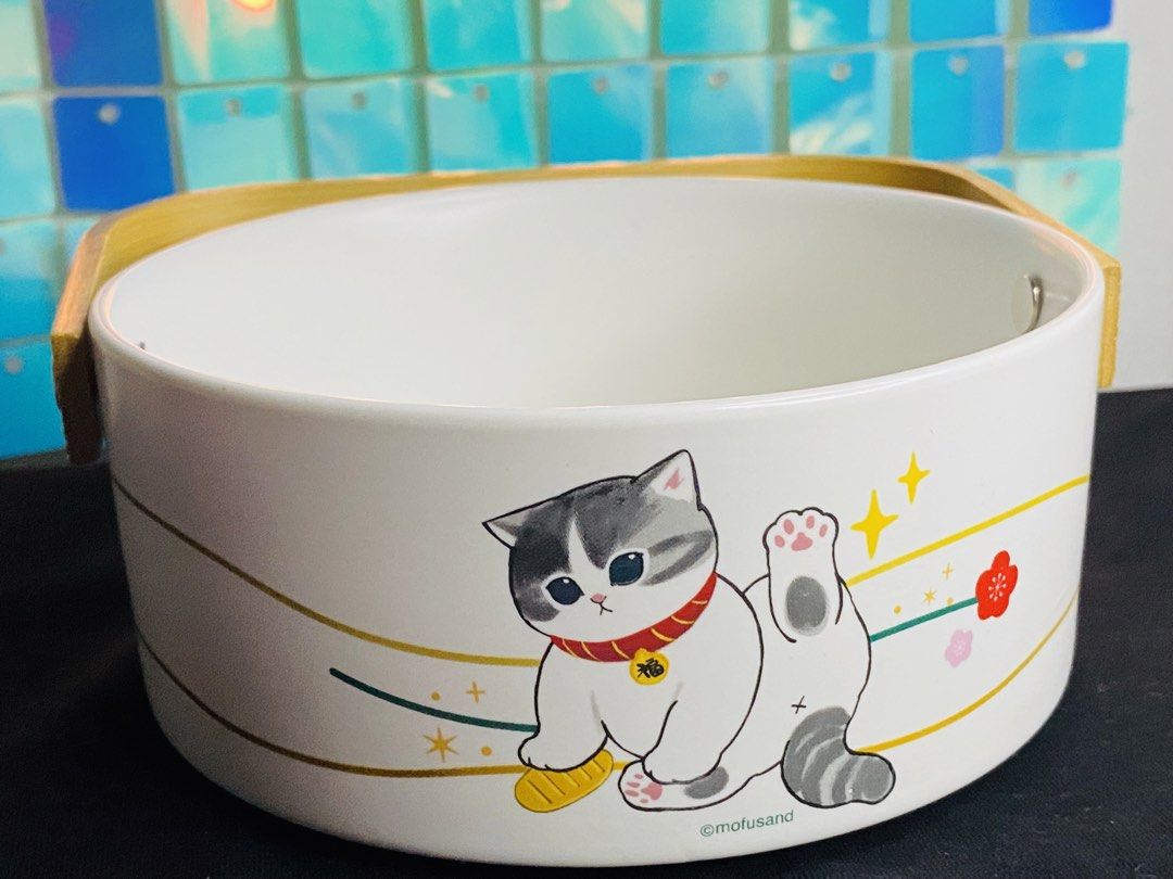Mofusand x Sunny Hills ceramic candy box (Category: Vintage Collectibles) located in Manila. Submitted by kawaii_omocha_est2020 (Listing ID 1461975228, Image 3). Description: Mofusand x Sunny Hills ceramic candy box featuring adorable illustrated cats and a curved wooden handle. ✅ Mine Now, Pay Now ✅ Please check all photos for complete details. ✅ Please manage your expectations, most items are preloved and not for those who are sensitive about c
