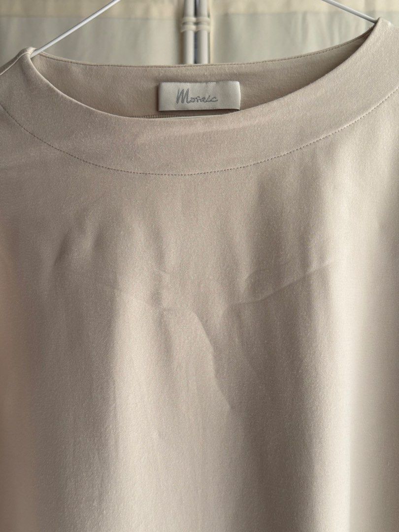 Mosaic Top (Ivory) (Category: Shirts) located in Quezon City. Submitted by statstudioph (Listing ID 1461865097, Image 3). Description: Mosaic Top * Php1,750 * laid flat measurements in cm: chest - 82, front length - 58, back length - 62 * free size * kind of loose * color: ivory * retail price: ₱2,380-2,980 * material: punto cotton * worn 2-3 times only, can pass as brand new * pick-up location: Katipunan, QC * rfs: decluttering * mop: BPI or GCa