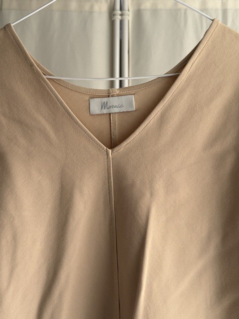 Mosaic Top (Tan) (Category: Shirts) located in Quezon City. Submitted by statstudioph (Listing ID 1461866136, Image 3). Description: Mosaic Top (Tan) * Php1,000 * laid flat measurements in cm: chest - 84, front length - 57, back length - 63 * free size * with slit at the sides * color: tan * retail price: ₱2,380-2,980 * material: punto cotton * used good condition * pick-up location: Katipunan, QC * rfs: decluttering * mop: BPI or GCash or COP Co
