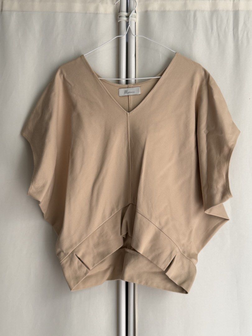 Mosaic Top (Tan) (Category: Shirts) located in Quezon City. Submitted by statstudioph (Listing ID 1461866136, Image 1). Description: Mosaic Top (Tan) * Php1,000 * laid flat measurements in cm: chest - 84, front length - 57, back length - 63 * free size * with slit at the sides * color: tan * retail price: ₱2,380-2,980 * material: punto cotton * used good condition * pick-up location: Katipunan, QC * rfs: decluttering * mop: BPI or GCash or COP Co