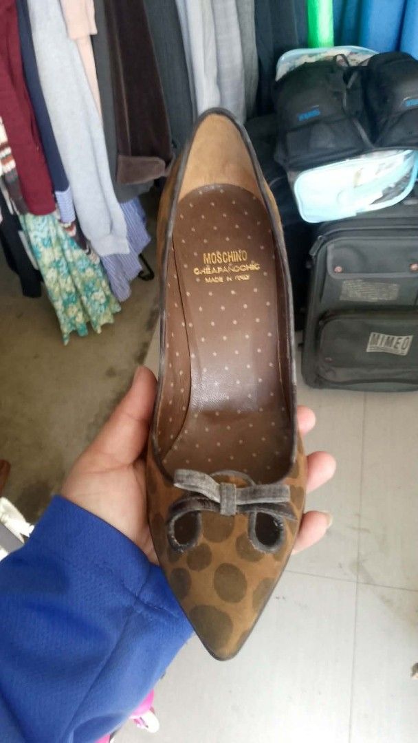 Moschino Cheap and Chic Brown Leopard Print Heels (Category: Heels) located in Manila. Submitted by romeoamoro00044 (Listing ID 1461946677, Image 1). Description: - Chic brown heels with a fun leopard print. - Elegant pointed toe design. - Adorable bow detail for a cute touch. - Made in Italy, ensuring quality craftsmanship. - Versatile for dressing up any outfit..