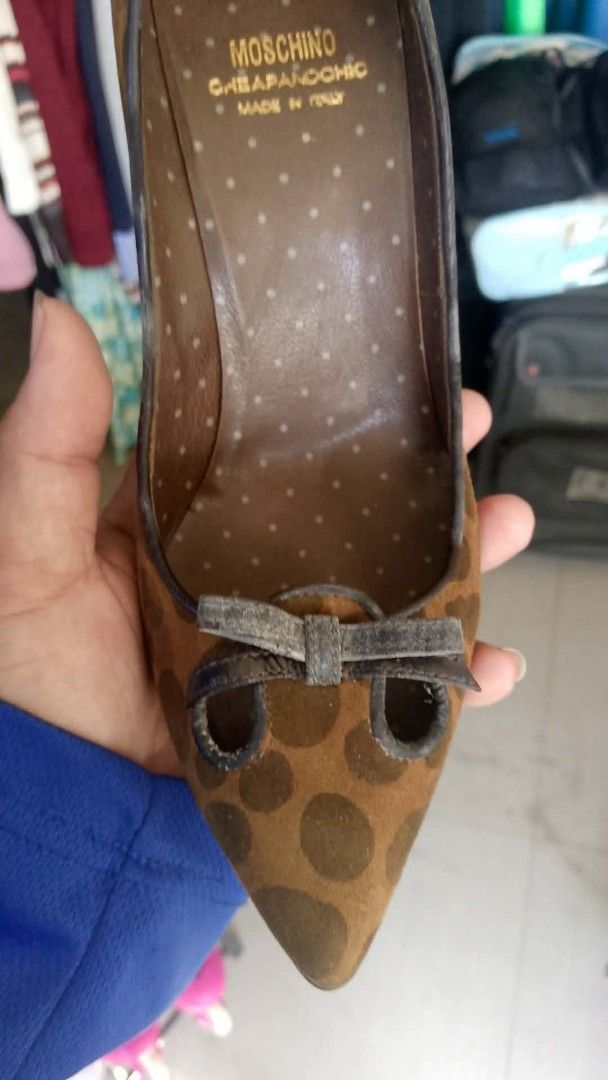 Moschino Cheap and Chic Brown Leopard Print Heels (Category: Heels) located in Manila. Submitted by romeoamoro00044 (Listing ID 1461946677, Image 3). Description: - Chic brown heels with a fun leopard print. - Elegant pointed toe design. - Adorable bow detail for a cute touch. - Made in Italy, ensuring quality craftsmanship. - Versatile for dressing up any outfit..