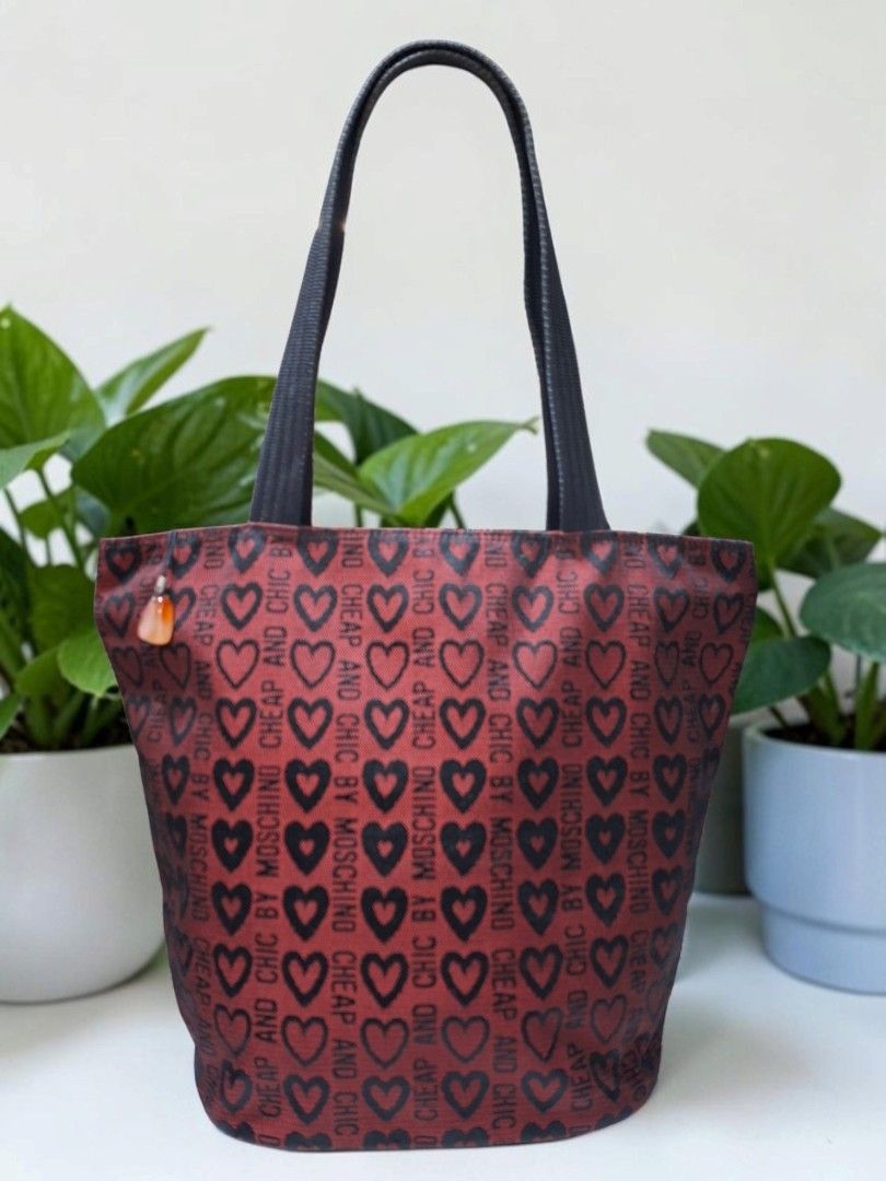 MOSCHINO CHEAP AND CHIC CANVAS ZIP TOTE BAG (Category: Tote Bags) located in Las Pinas. Submitted by annachiaonair2037 (Listing ID 1461986586, Image 2). Description: MOSCHINO CHEAP AND CHIC CANVAS ZIP TOTE BAG FROM JAPAN YKK ZIP HANDLE DROP 8.5" H 10.5" L 13.5" W 6" Disclaimer: I am not affiliated with, associated with, or authorized by any of the brands featured posted. Any mention of brand names, trademarks, or logos is solely for identificatio