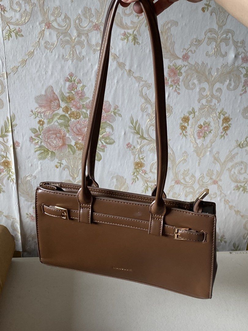 Mossdoom brown retro shoulder bag (Category: Shoulder Bags) located in Bacoor. Submitted by horchataeri (Listing ID 1461873376, Image 1). Description: Preloved Mossdoom Brown retro shoulder bag -issue posted -condition: 7/10 originally bought for 700.