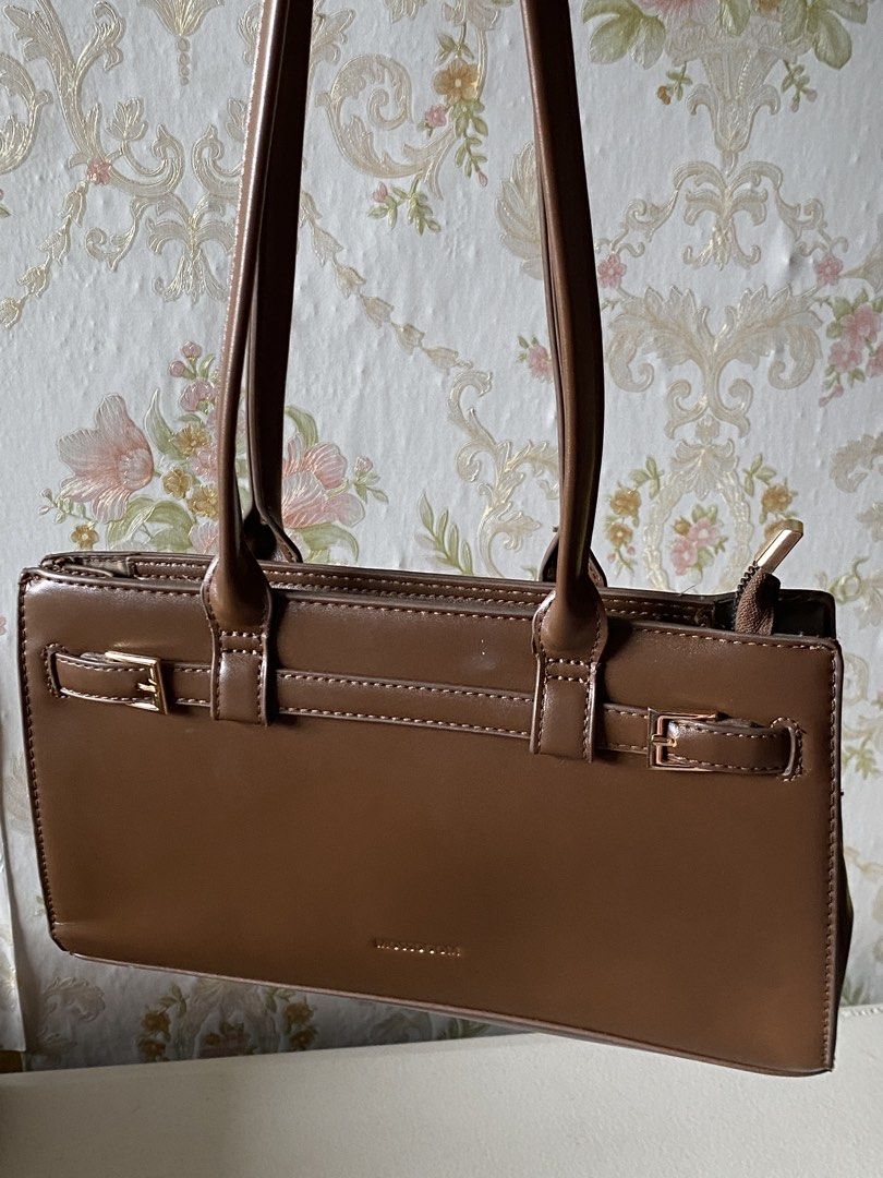 Mossdoom brown retro shoulder bag (Category: Shoulder Bags) located in Bacoor. Submitted by horchataeri (Listing ID 1461873376, Image 2). Description: Preloved Mossdoom Brown retro shoulder bag -issue posted -condition: 7/10 originally bought for 700.