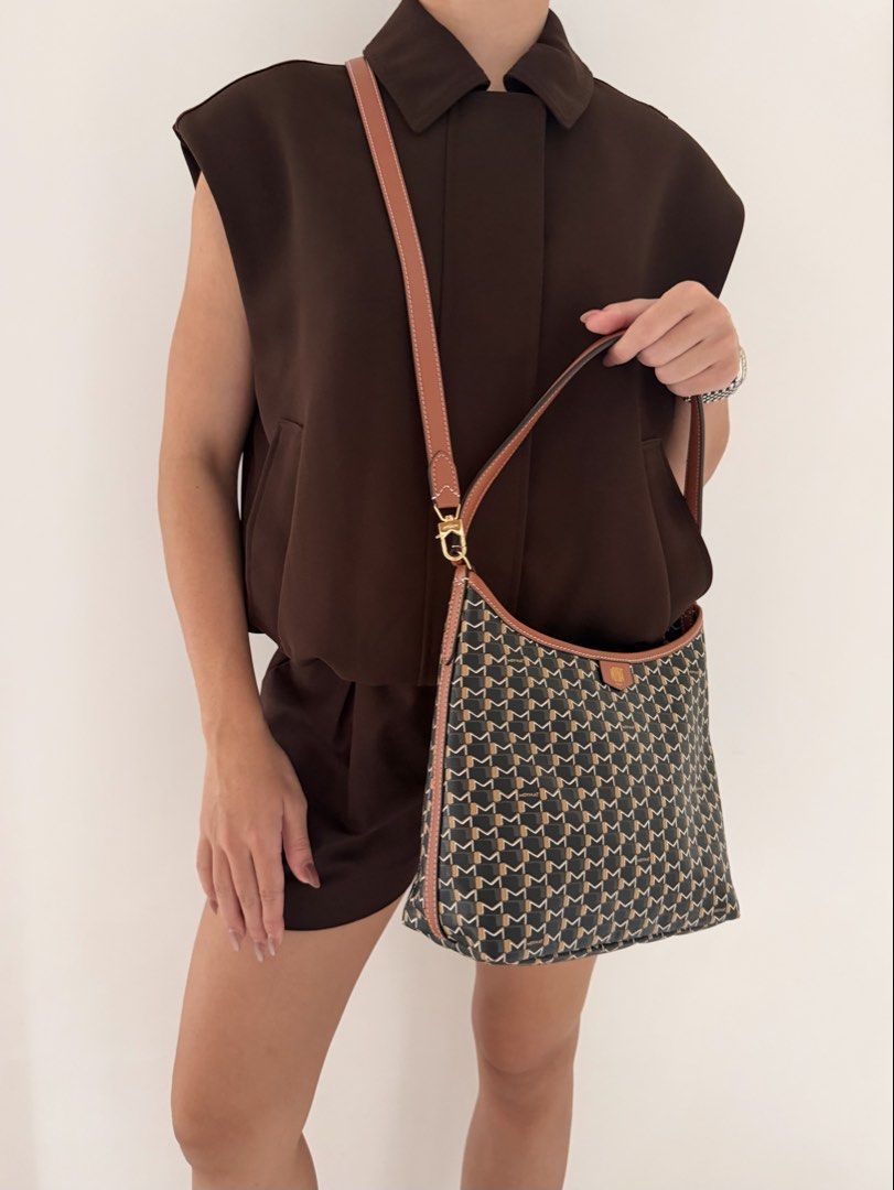 Moynat Hobo Mini in Black/ Tan (Category: Luxury Bags & Wallets) located in Quezon City. Submitted by lian_closet (Listing ID 1461987772, Image 2). Description: Moynat Hobo Mini in Black/ Tan Best Price: ₱90,000 Preloved Comes with Detachable Long Strap, Care Booklets, Dust Bags, Receipt & LegitGrails Authenticity Certificate Preloved Rating: 9.5/10 Excellent No glazing issues Light scuff on one corner Interior is clean .