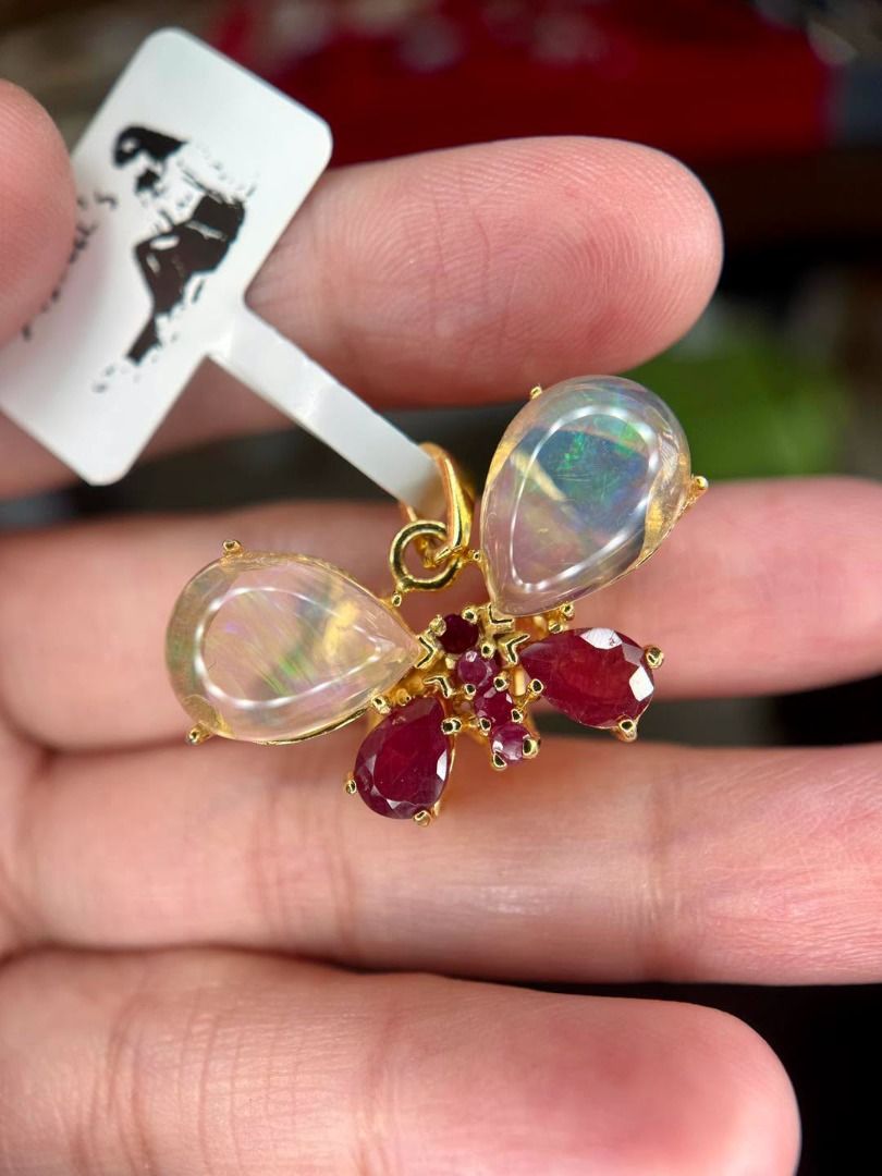 NATURAL OPAL & RUBY BUTTERFLY PENDANT (Category: Body Jewelry) located in Baguio. Submitted by asna_taku (Listing ID 1461890730, Image 1). Description: 🦋 NATURAL OPAL & RUBY BUTTERFLY PENDANT ✨ A BEAUTIFUL ONE-OF-A-KIND STATEMENT PIECE 💗 Delicate, colorful, and absolutely eye-catching! 🦋✨ This gorgeous butterfly pendant combines natural opal with rich red ruby accents, creating a beautiful contrast of dreamy iridescence and vibrant color. 🤍 N