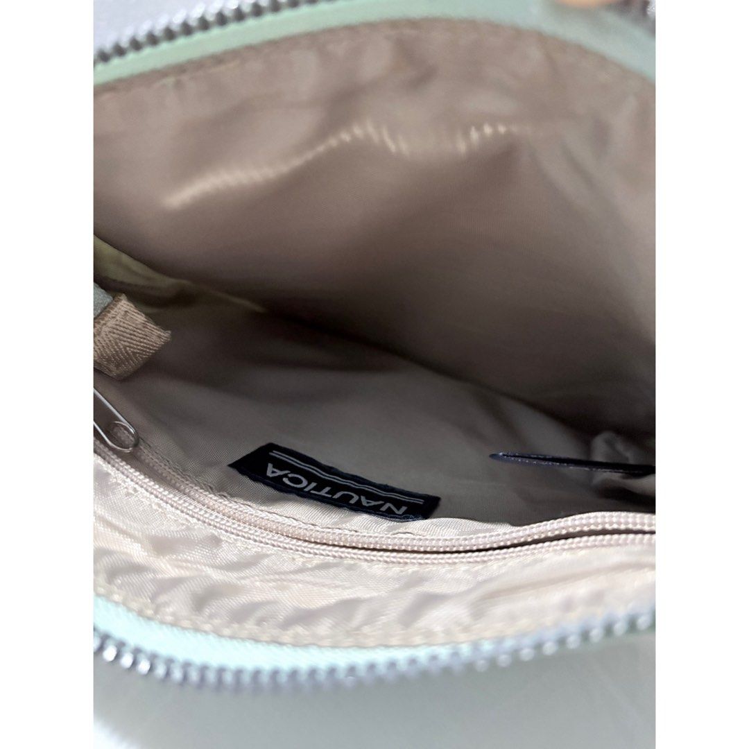 Authentic Nautica Diver Nylon Small Crossbody Bag (Category: Cross-body Bags) located in Caloocan City. Submitted by 888filterroom (Listing ID 1461903213, Image 2). Description: ೀ Nautica Diver Nylon Small Crossbody Bag ⋆౨ৎ˚⟡˖ ࣪ 🏷️ ₱1,500 જ⁀➴ 9/10 condition Details: 𐔌 . ⋮ Dimensions: Approximately 8.5” H x 9” W x 1.75” D .ᐟ ֹ ₊ ꒱ Inclusions: ꫂ❁ NONE 📍South Caloocan, Barangay 28 <𝟑 .ᐟ Message me if interested.