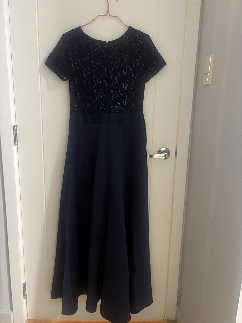 Navy Blue Sequin Lace Maxi Dress (Category: Dresses) located in Pasig City. Submitted by AddyCB (Listing ID 1462027297, Image 2). Description: - Navy blue maxi dress - Sequin lace top with short sleeves - Smooth, flowing skirt fabric - Zipper closure at the back - Ideal for formal events and parties - Comfortable and flattering fit - Bought from SM - Very good condition RFS: Decluttering (just stored) Size: Medium .