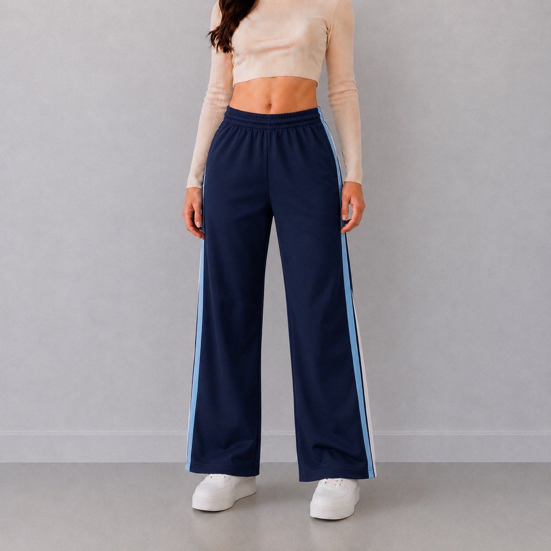 Navy Blue Track Pants with Light Blue Stripes Jogging Pants (Category: Other Bottoms) located in San Ildefonso. Submitted by rgdeclutters (Listing ID 1462029271, Image 2). Description: W - 24-28" L - 33.5".