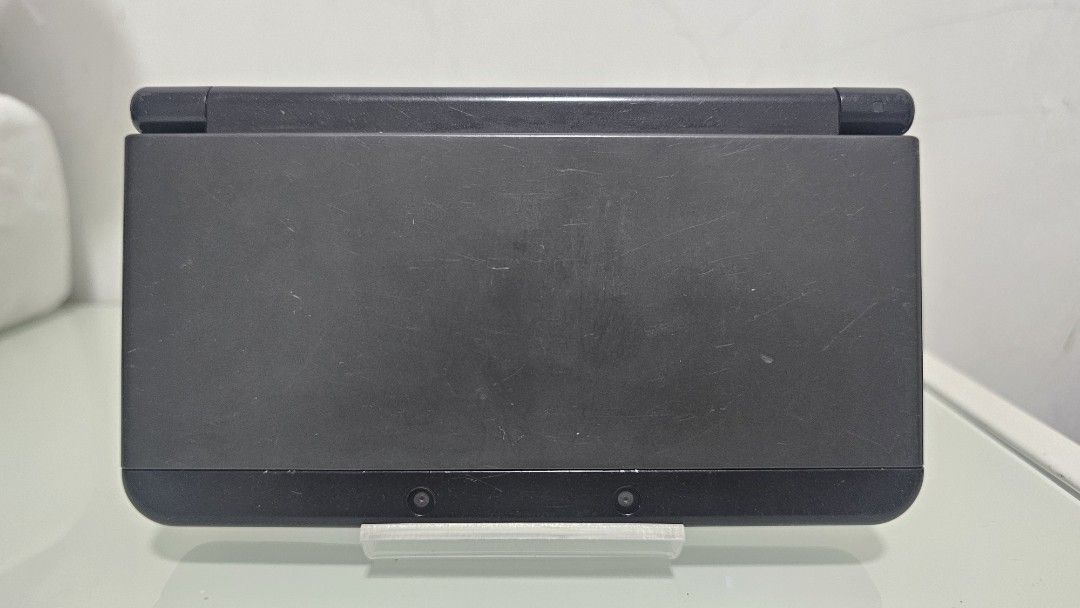 New Nintendo 3DS Black (Category: Nintendo) located in Butuan. Submitted by taruzakuyo95274 (Listing ID 1461913955, Image 1). Description: - Black New Nintendo 3DS - Unit only with replacement stylus - Minor cosmetic scratches on exterior - WYSIWYG.