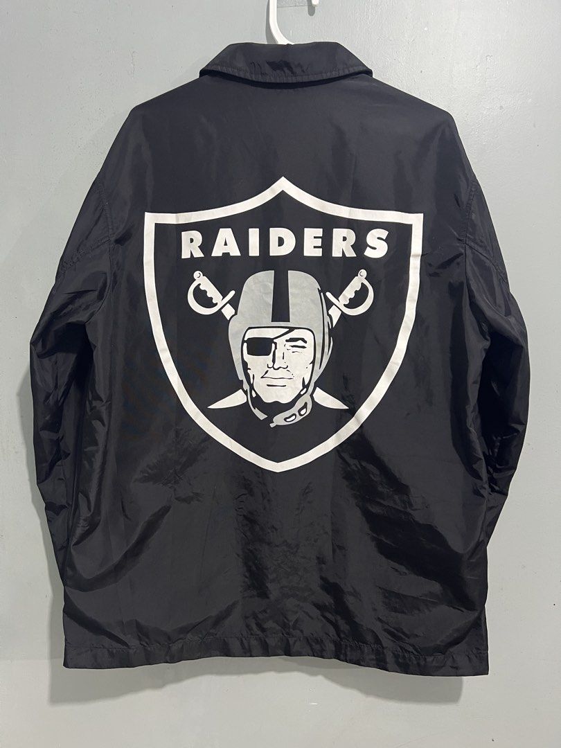 NFL Las Vegas Raiders Team Apparel Jacket (Category: Coats, Jackets and Outerwear) located in Baguio. Submitted by costacash (Listing ID 1461841030, Image 1). Description: - Black Raiders jacket from NFL Team Apparel - Features iconic Raiders shield logo on the back - NFL branding on sleeve and front - Convenient snap button closure - Elasticated cuffs and hem for a comfortable fit - Size: Large (L) - A must-have for any Las Vegas Raiders fan! - 