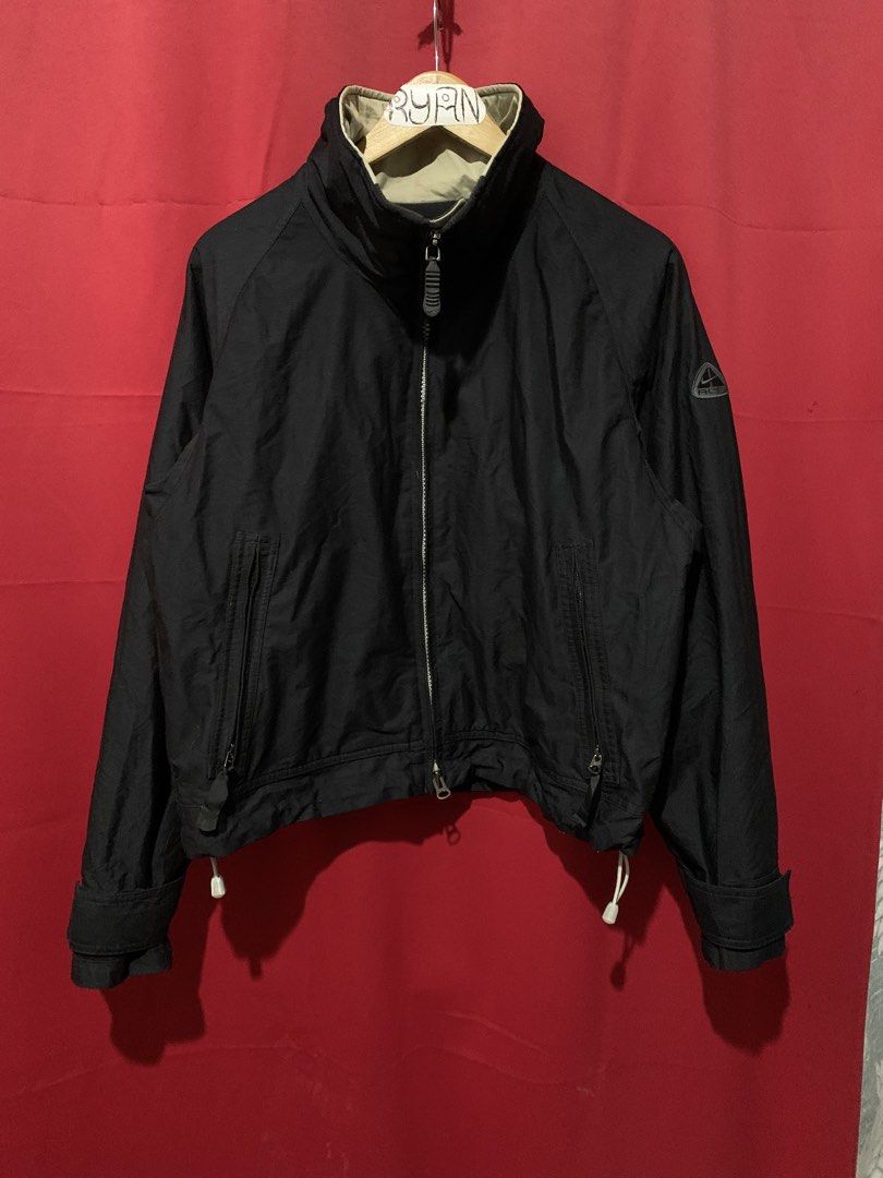 Nike ACG Black Jacket (Category: Coats, Jackets and Outerwear) located in Davao. Submitted by ryanagujet27568 (Listing ID 1461983844, Image 1). Description: - Black Nike ACG jacket - Full zip front with stand-up collar - Two front zip pockets - Adjustable drawstring hem - ACG logo on left sleeve - Ideal for outdoor adventures.