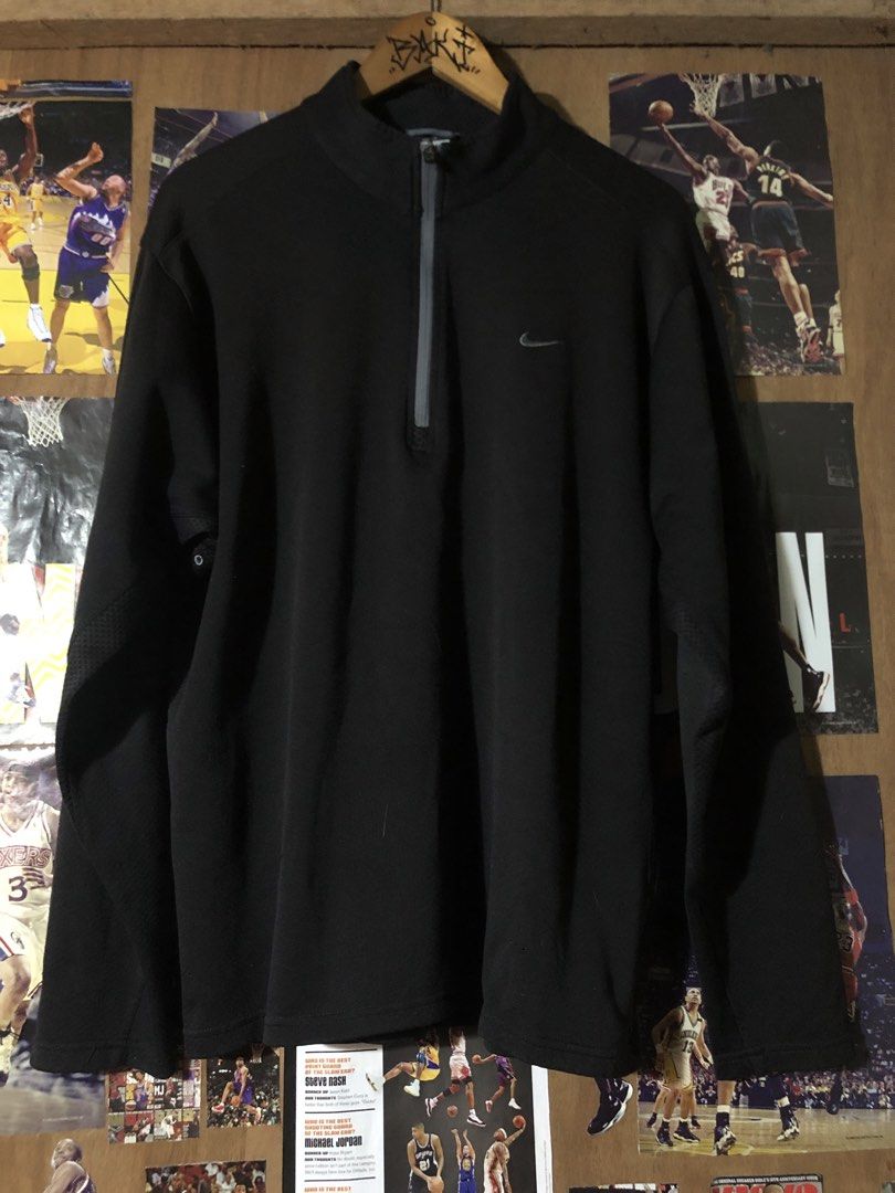 Nike Black 1/4 Zip Pullover Sweatshirt (Category: Coats, Jackets and Outerwear) located in Manila. Submitted by bakithrift213 (Listing ID 1461850778, Image 1). Description: - Black Nike pullover sweatshirt - 1/4 zip closure at the neck - Small Nike swoosh logo on the chest - Mesh paneling on the sides of the sleeves - Ideal for workouts or casual wear.