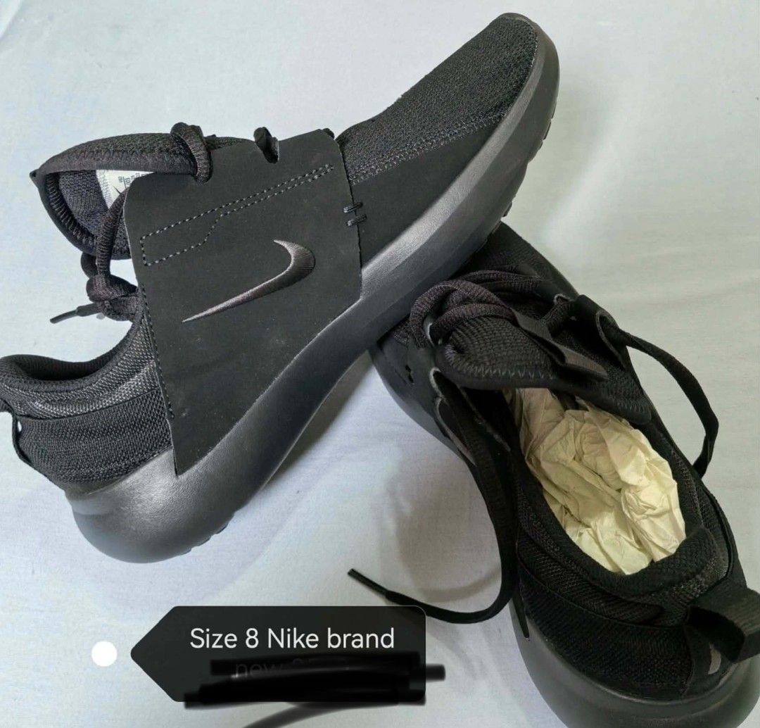 Nike Black Running Shoes Size 8 (Category: Sneakers) located in Calamba. Submitted by lovelyfranz (Listing ID 1461842441, Image 1). Description: - Black Nike shoes - Size 8 - Suitable for running or casual wear - Black laces - Iconic Nike logo on the side - Black sole.