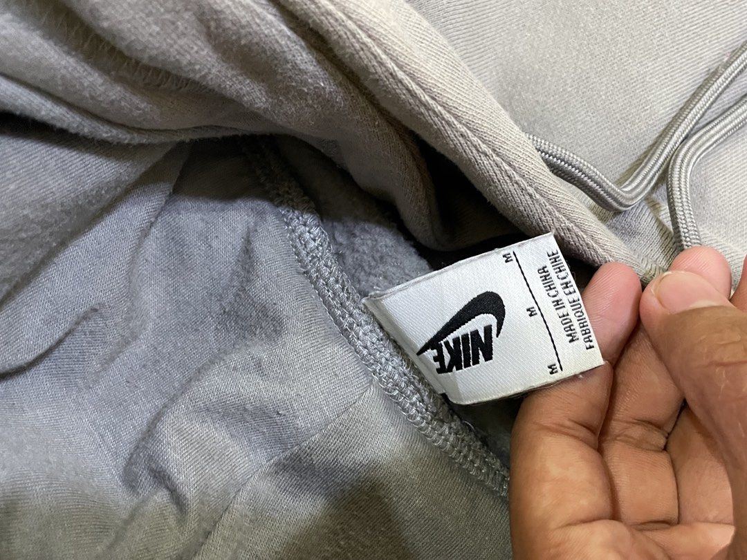 Nike collab essntials (Category: Hoodies) located in Calauag. Submitted by lemsthrift (Listing ID 1461974107, Image 3). Description: Nike collab essentials authentic Issue sun fade nasa pic Dimes Width:26.5 Length:25.5.