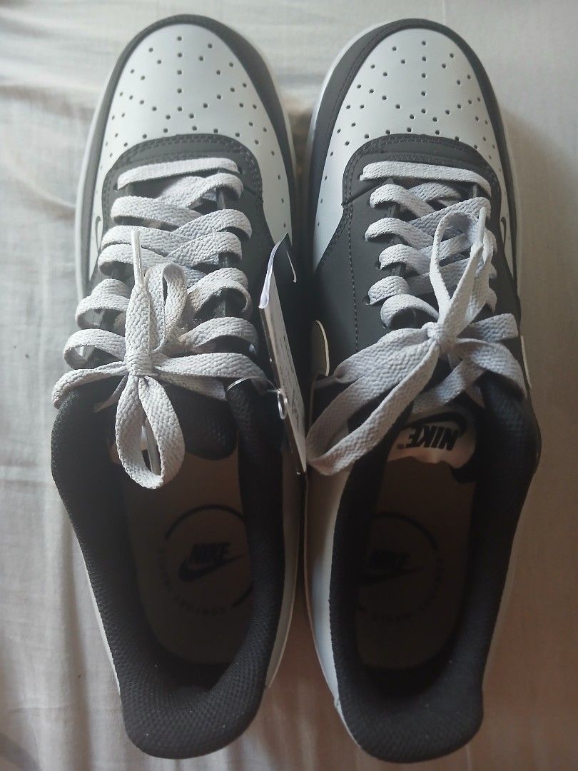 Nike Court Vision Low Sneakers (Category: Sneakers) located in Quezon City. Submitted by raaaaaff (Listing ID 1461912109, Image 2). Description: Classic Nike low-top sneakers in black and grey. Features a perforated toe box and light grey laces. Perfect for daily wear. Brand new with original tags. Size 11 Brand New Original No Box.