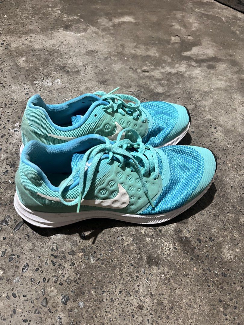 Nike Downshifter 7 Teal Blue Running Shoes (Category: Sneakers) located in Tuguegarao City. Submitted by mgrmt (Listing ID 1461908480, Image 2). Description: - Teal blue Nike Downshifter 7 running shoes - Size: 5.5Y / 38 EUR - Perfect for running or casual wear - Shows some signs of wear, plenty of life left - Please check photos for detailed condition.