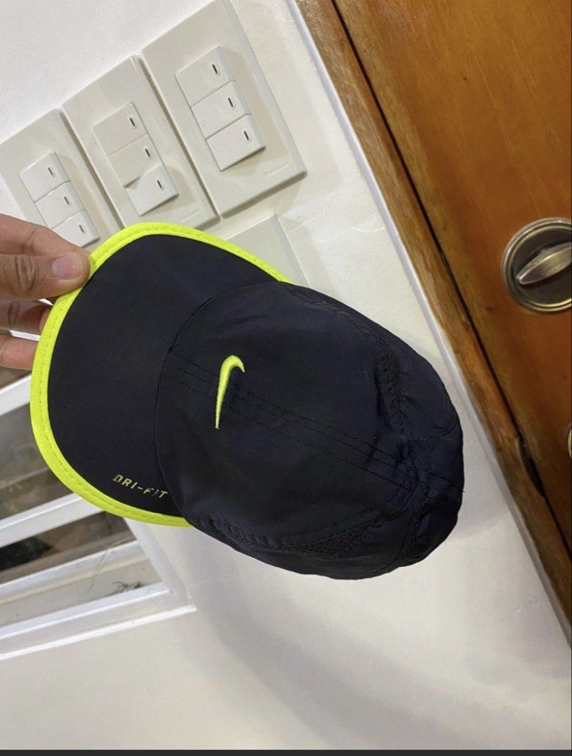 Nike Dri-Fit Cap Black Neon Yellow (Category: Babies & Kids Fashion) located in Legazpi City. Submitted by iceyag (Listing ID 1461836305, Image 1). Description: - Black Nike cap with striking neon yellow trim - Features the iconic Nike swoosh logo - Equipped with Nike Dri-Fit technology for sweat management - Adjustable strap at the back for a customized, snug fit - Lightweight and breathable material, ideal for sports or everyday casual wear.