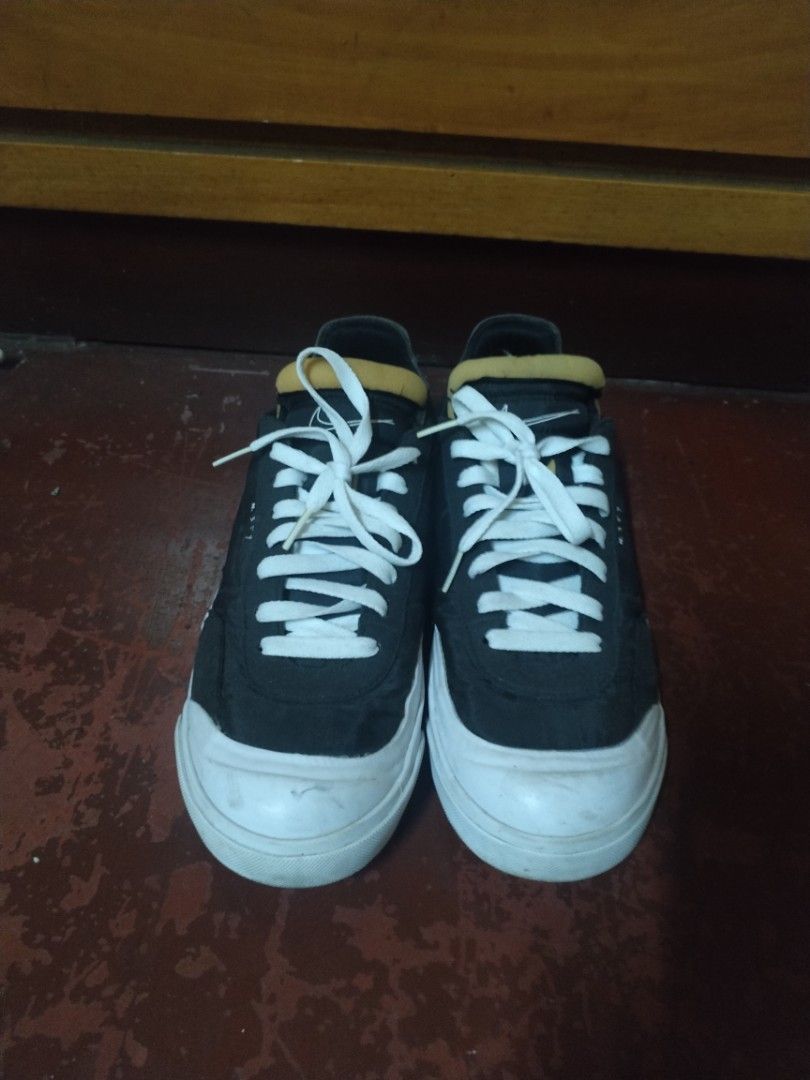Nike Drop Type LX (Category: Sneakers) located in Manila. Submitted by patrickdeclutters (Listing ID 1461890785, Image 2). Description: Black Nike SB Zoom Blazer Low sneakers with white laces and soles. Features "N.357" detail and yellow ankle padding. Minor scuffs on soles. Perfect for skating or casual wear..
