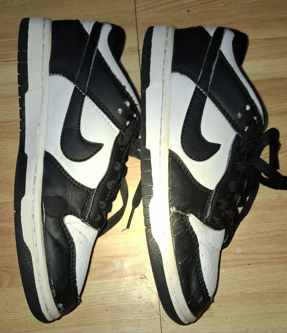 Nike Dunk Low Black White Panda (Category: Sneakers) located in Rizal. Submitted by apparelit115185 (Listing ID 1461873812, Image 3). Description: - Classic black and white Nike Dunks (Panda colorway) - Worn a few times - Minor scuffs on toe box and sides - Soles show some wear but have plenty of life left - Black laces - Great for everyday wear - 24 to 24.5 cm.