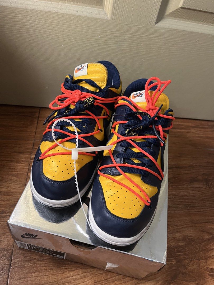 Nike Dunk Low Off-White University Gold Navy (Category: Sneakers) located in Quezon City. Submitted by paul13c (Listing ID 1461853623, Image 2). Description: - Off-White x Nike Dunk Low - University Gold and Navy colorway - Includes original box and tags - Highly sought-after collaboration - Perfect for sneaker collectors - Iconic and collectible kicks.