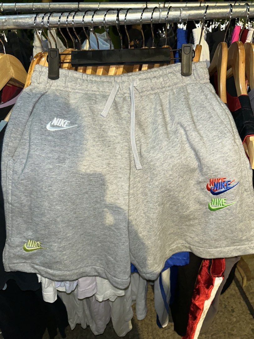 Nike Grey Sweat Shorts Size S (Category: Shorts) located in Davao. Submitted by ruggedthrift444 (Listing ID 1461818581, Image 1). Description: - Grey Nike sweat shorts - Size S - Multiple colorful Nike logos - Elastic waistband with drawstring - Two side pockets and one back pocket - Made in Pakistan.