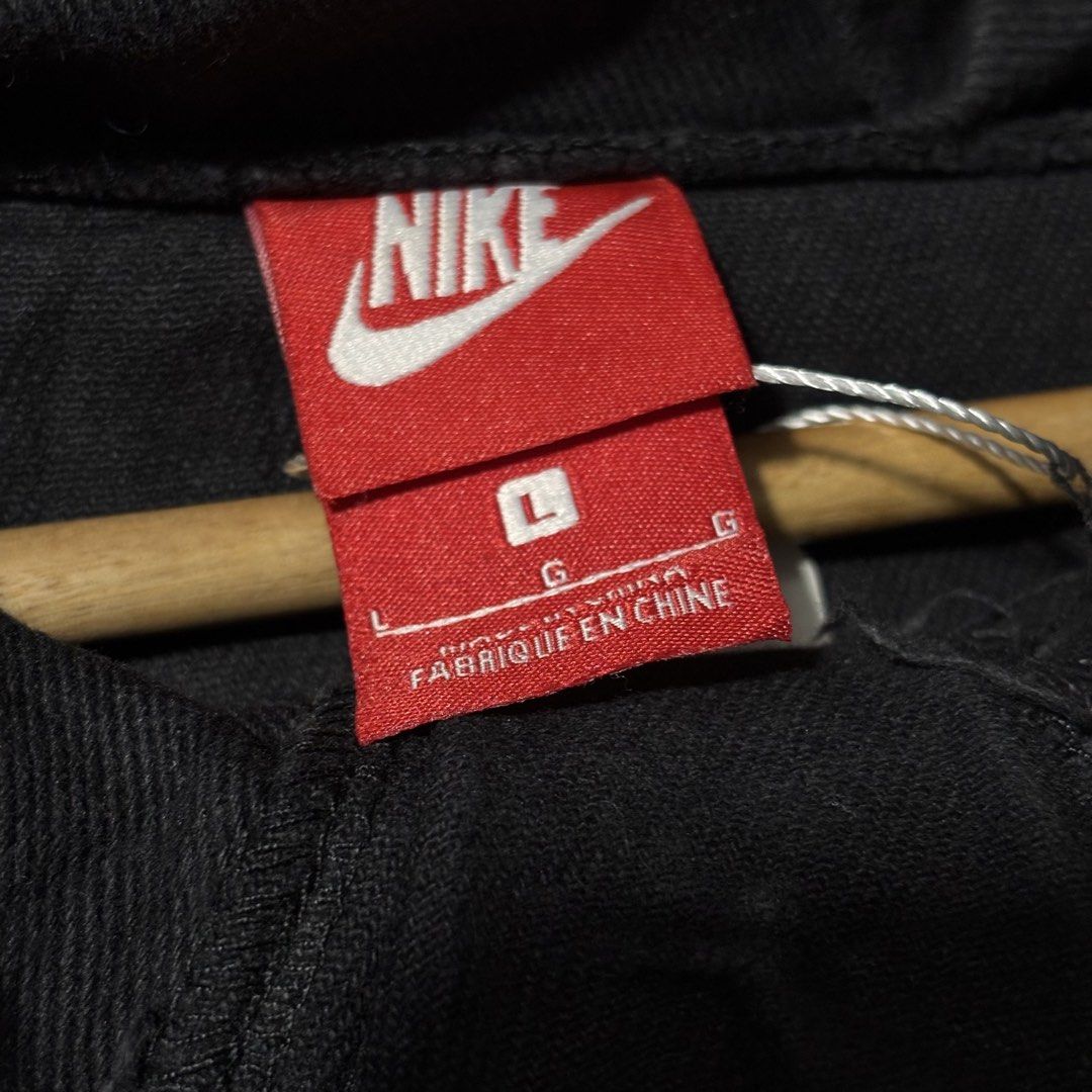 Nike Hoodie Jacket Black White Large (Category: Coats, Jackets and Outerwear) located in Caloocan City. Submitted by bonsatocha43876 (Listing ID 1461984493, Image 2). Description: - Black Nike hoodie jacket - Grey hood - White Nike logo on back - Quarter zip closure - Front pouch pocket - Size: Large (L) - Measurements: Width 25 inches, Length 26 inches - Complete with original tags - Take all.