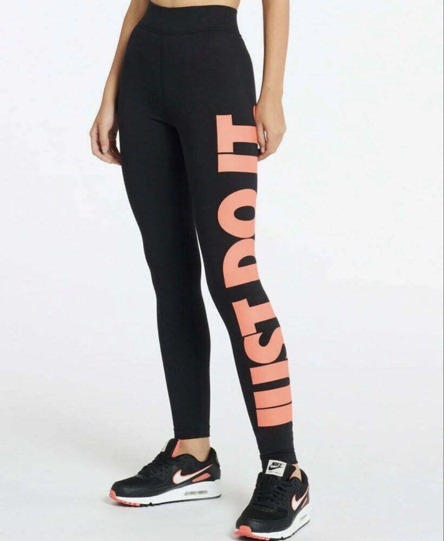 Nike Just Do It Black Leggings (Category: Activewear) located in Makati City. Submitted by malcolmkenji (Listing ID 1461897404, Image 2). Description: - Brand: Nike - Color: Black with coral orange 'Just Do It' slogan - Length: Full length - Features: Comfortable and stretchy material - Versatile: Ideal for workouts or casual wear.