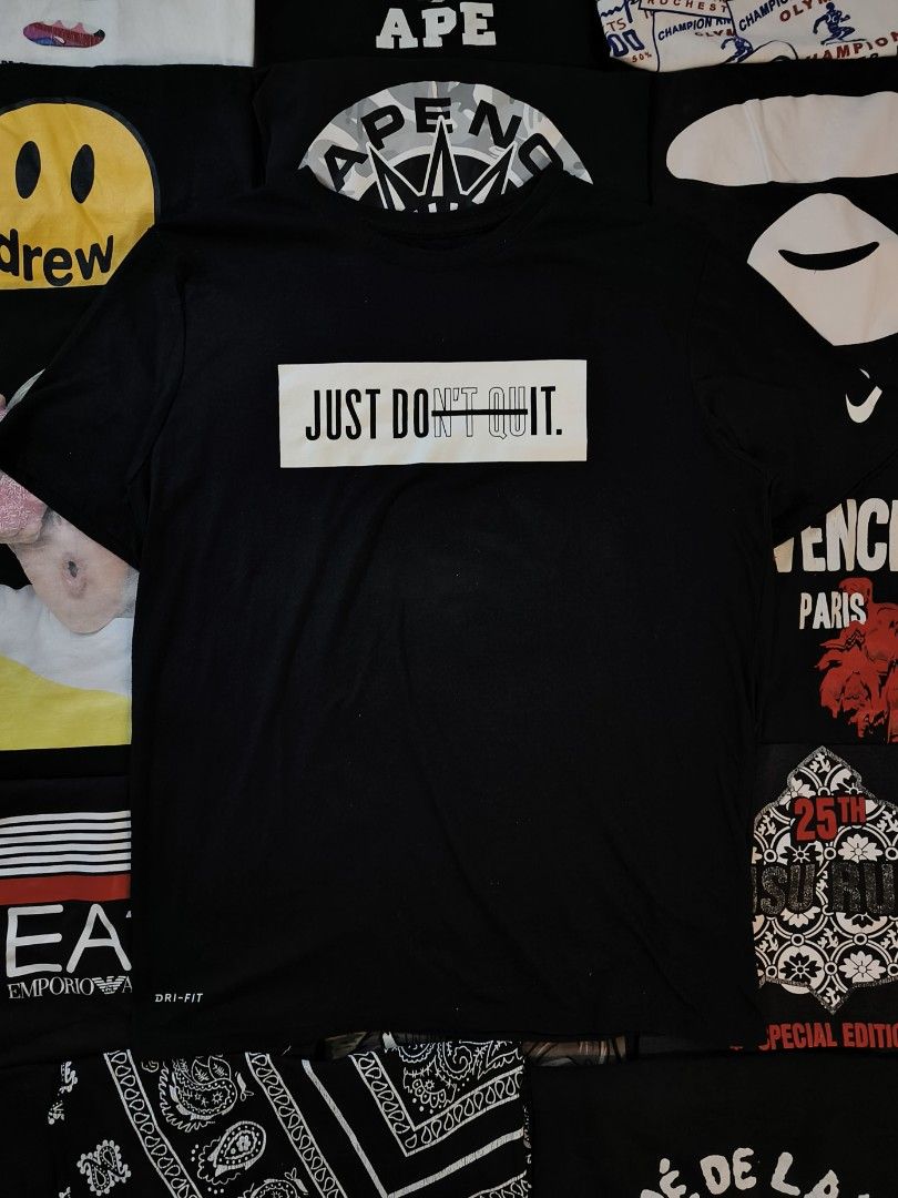 Nike "Just Don't Quit" Black (Category: Tshirts & Polo Shirts ) located in San Fernando. Submitted by retro_d (Listing ID 1462004214, Image 2). Description: - Nike "Just Don't Quit" Black - Size: XL on tag (W21.5/L28) - Condition: Good - Color Rate: 9/10 - No Issue.