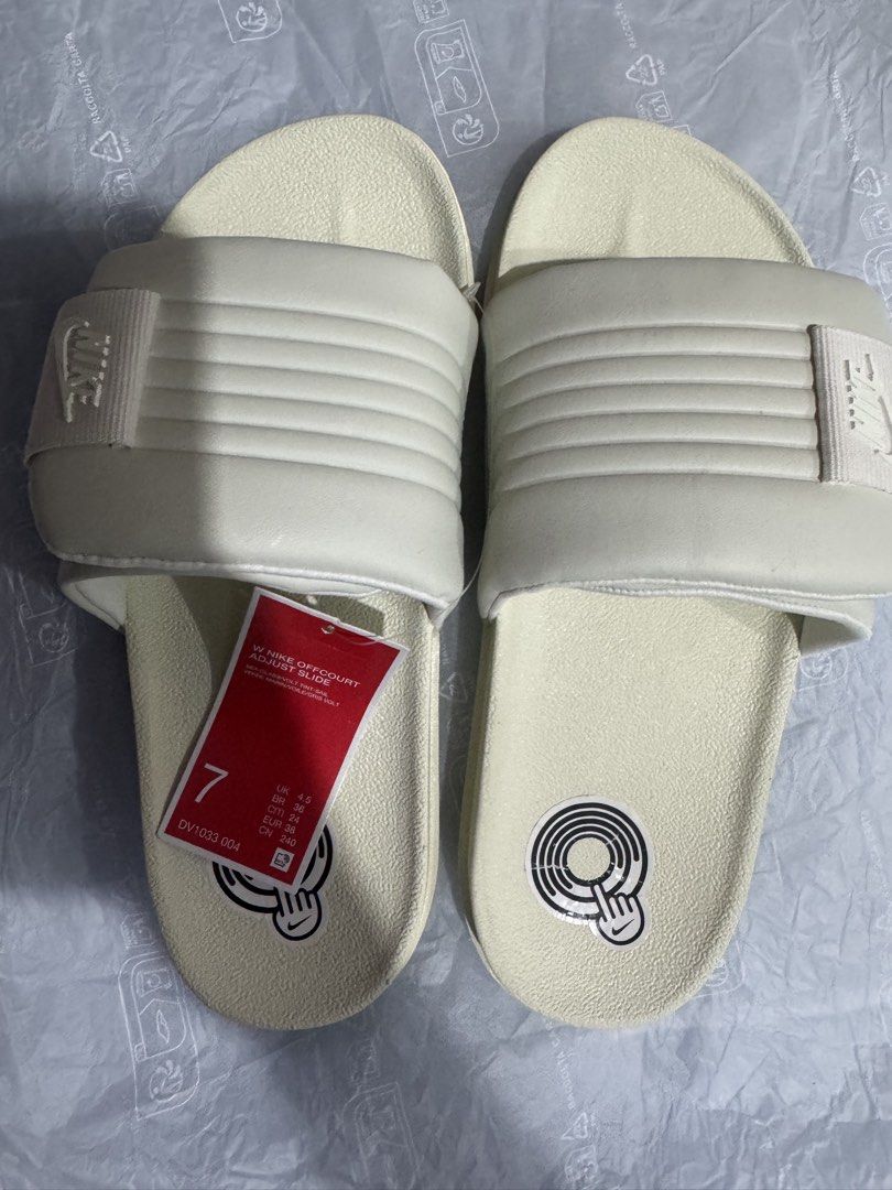 Nike Offcourt Adjust Slide Size 7 (Category: Slippers & Slides) located in Quezon City. Submitted by andreaeliz (Listing ID 1461855642, Image 1). Description: - Brand: Nike - Model: Offcourt Adjust Slides - Color: Sail/Volt Tint-Sail - Size: UK 7 - Features: Super comfy, easy to wear - Ideal for: Casual outings, after sports - Condition: Brand new with original tags.
